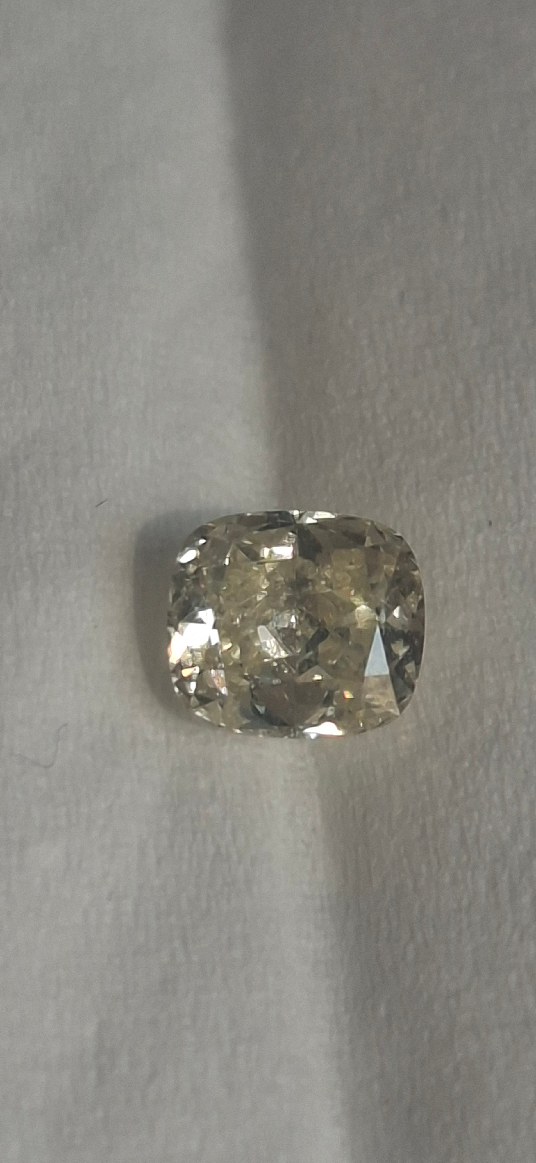 0.61 Carat Fancy Yellow Diamond With Certificate