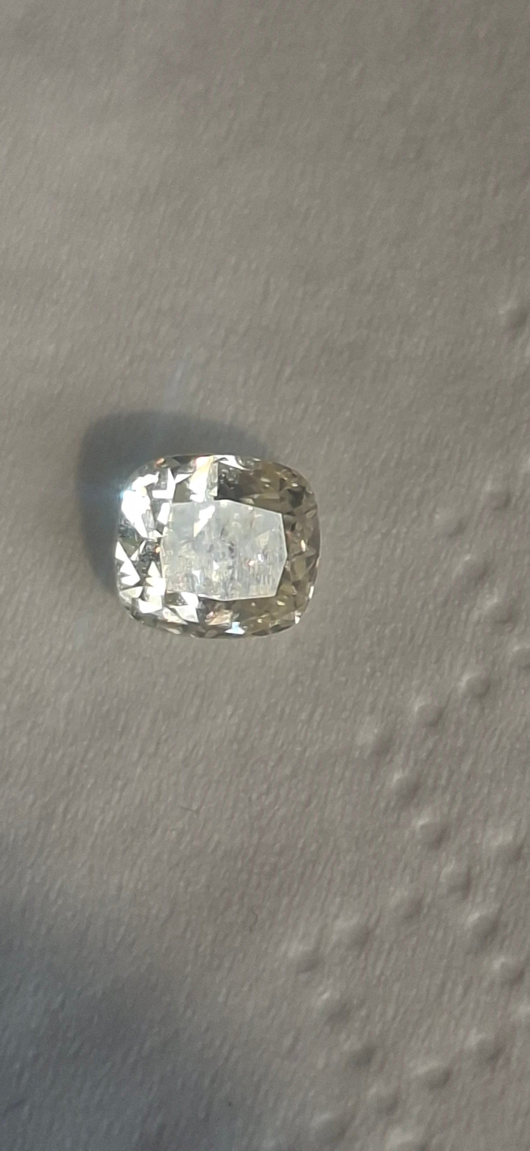 0.61 Carat Fancy Yellow Diamond With Certificate