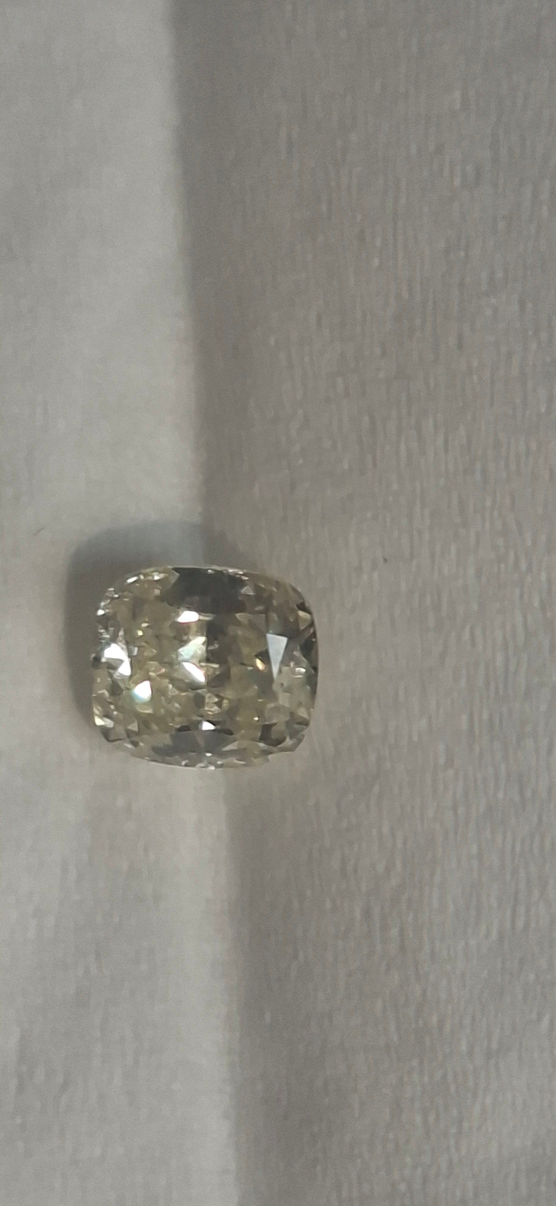 0.61 Carat Fancy Yellow Diamond With Certificate