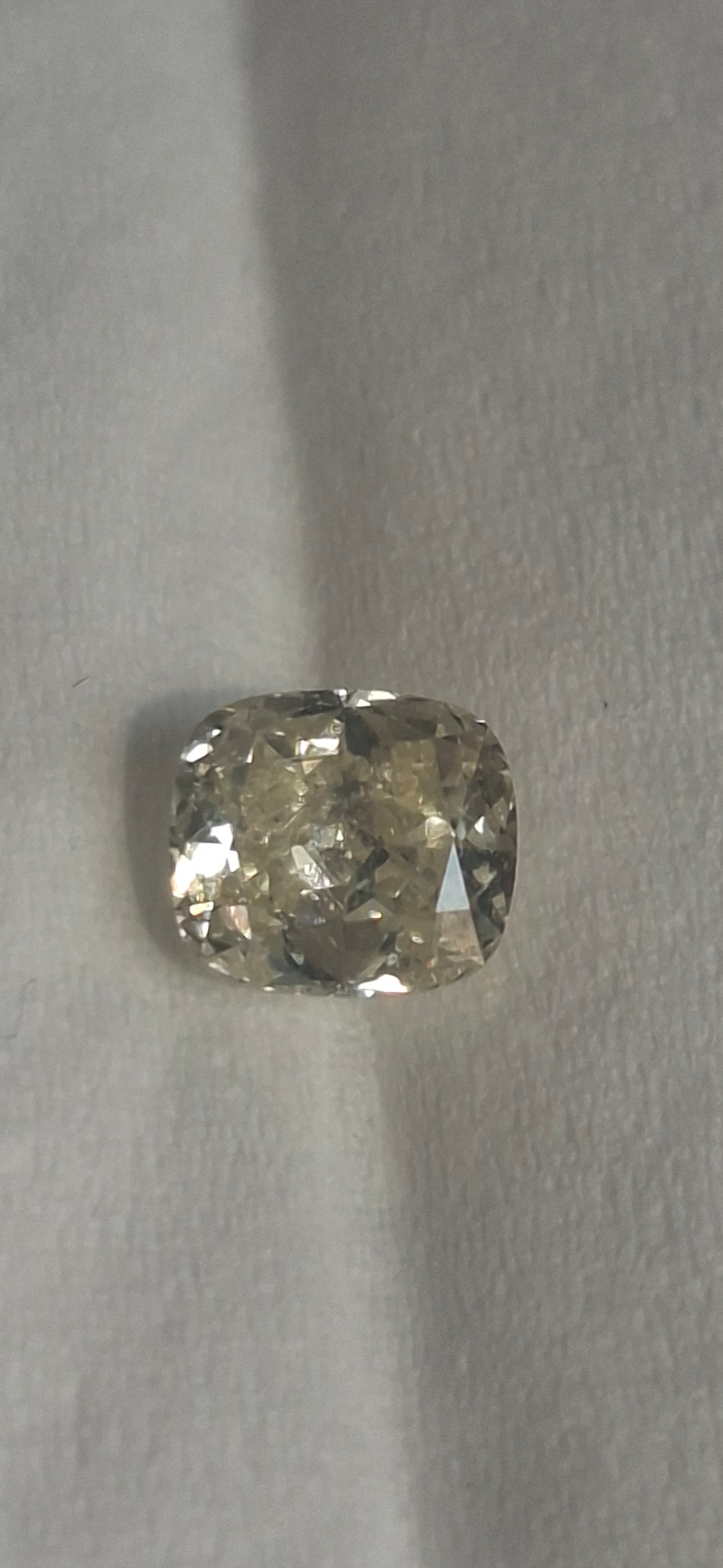 0.61 Carat Fancy Yellow Diamond With Certificate
