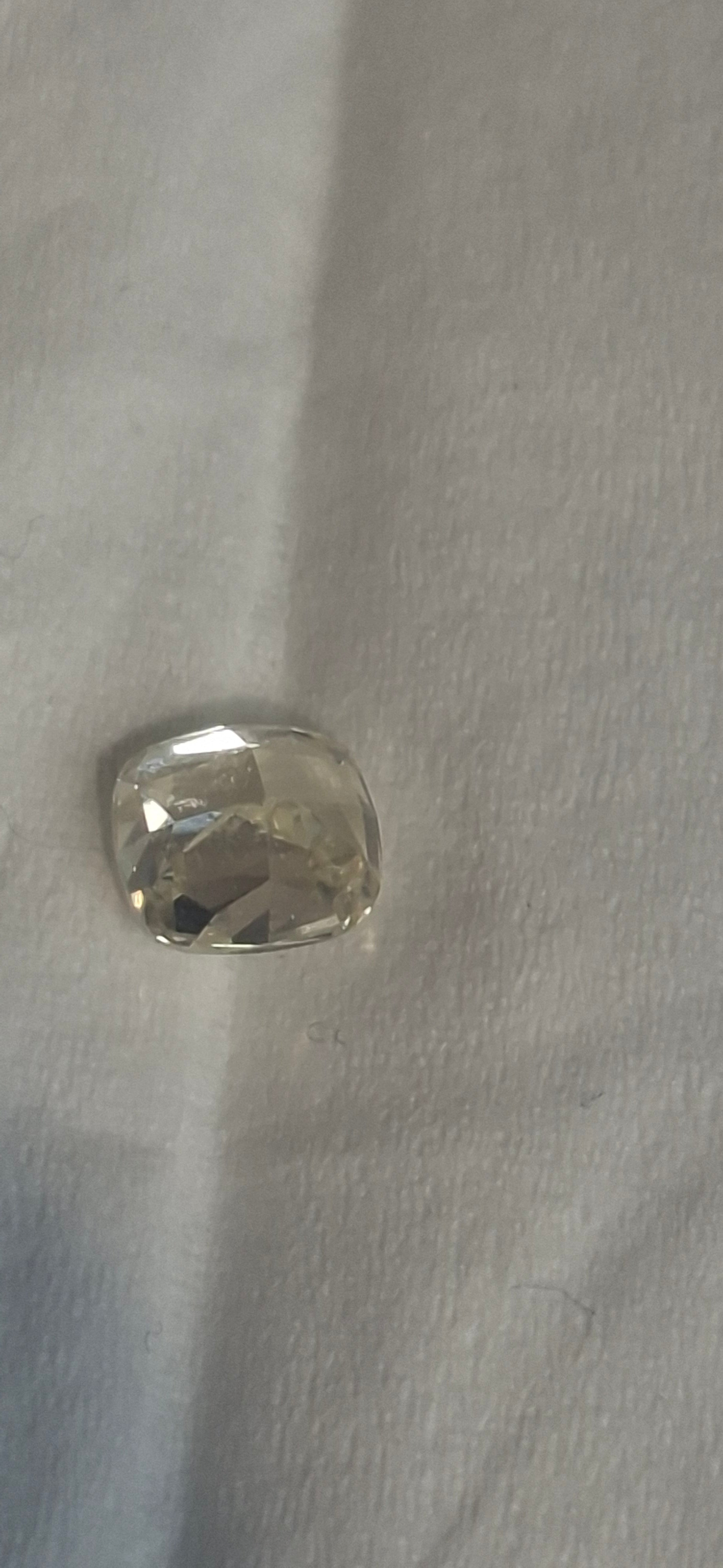 0.61 Carat Fancy Yellow Diamond With Certificate